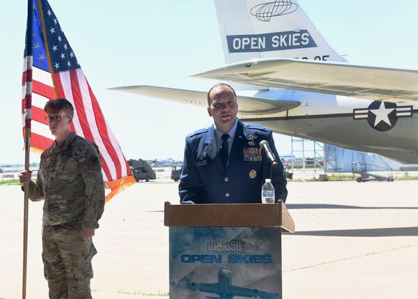Colonel John Litecky, 55th Operations Group commander, gives opening remarks during the Open Skies 670 retirement ceremony at Lincoln Airport, Nebraska, on 4 June. (US Air Force)