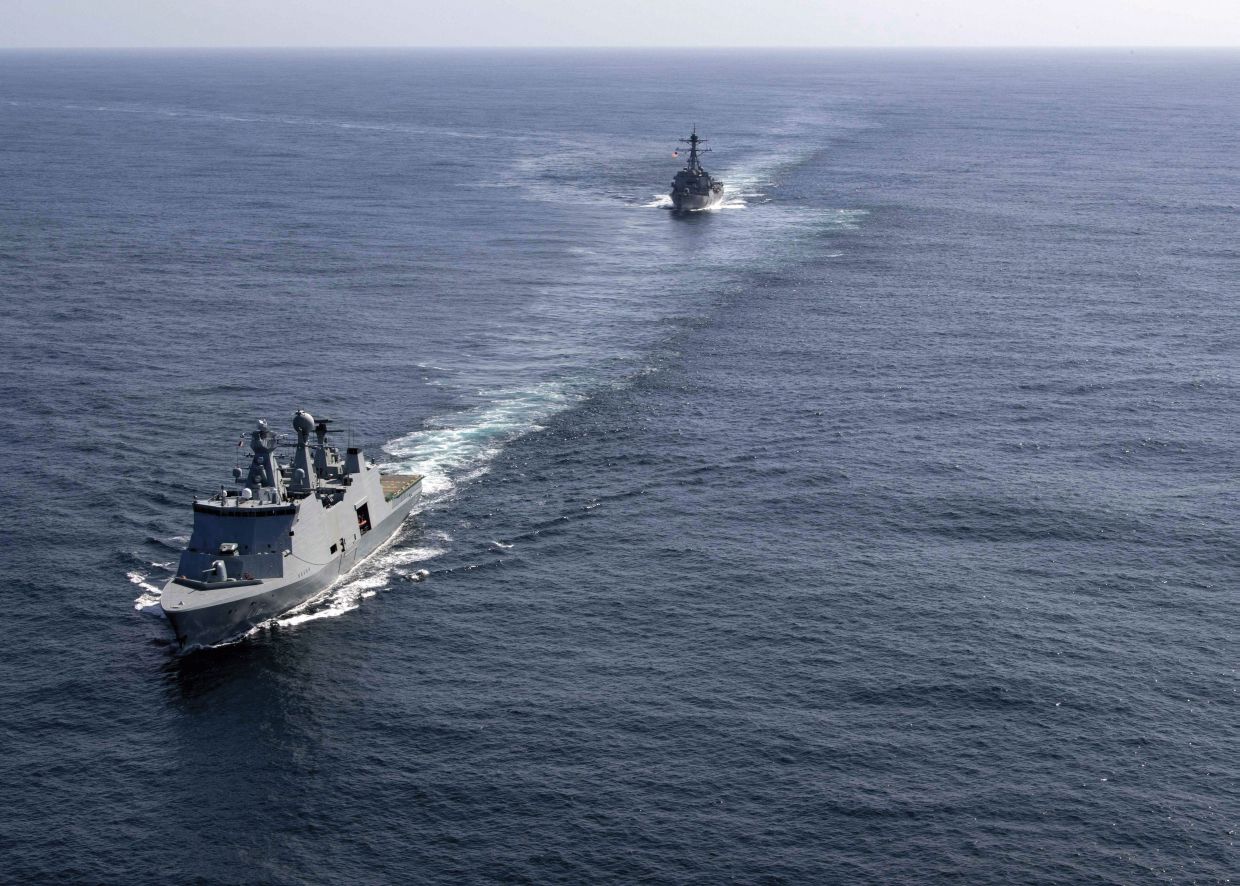 
        The Royal Danish Navy lead combat support ship HDMS
        Absalon
        and the US Navy’s DDG 51 Arleigh Burke-class guided-missile frigate USS
        Gravely
        conduct a passing exercise (PASSEX) off Greenland in August 2019.
        Absalon
        was the second of Denmark’s major warships to deploy to the country’s Joint Arctic Command in 2019.
       (US Navy)