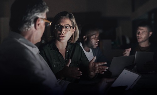 Image of defence operatives in discussion