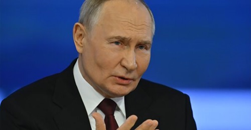 Russian President Vladimir Putin speaks at his annual televised new conference at the Gostiny Dvor Trade and Exhibition Centre