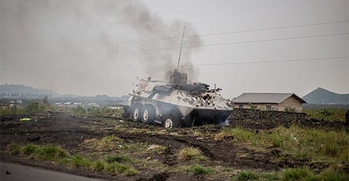 Smoke rises from a Uruguayan Armoured Vehicle General Purpose