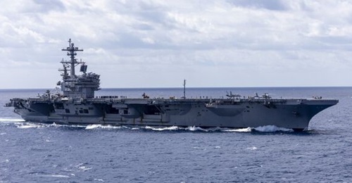 Aircraft carrier USS George HW Bush, shown here, departed Norfolk, Virginia, for deployment.