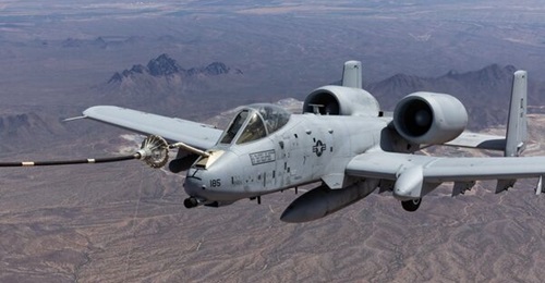 An A-10 Thunderbolt II refuels from a C-130 using a probe and drogue system for the first time in the aircraft's history, on 2 April 2026.