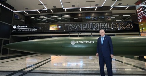 Turkiye's President Recep Tayyip Erdogan stands in front of a Roketsan Tayfun Block 4 ballistic missile on 7 April 2026.