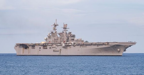 USS Tripoli, shown here, is one of the US shows conducting the blockade within the Strait of Hormuz.