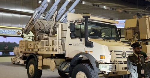 One of Qatar's mobile NASAMS launchers displayed at the DIMDEX exhibition in January 2026. Visible are two AIM-120 AMRAAM training rounds with what are presumably models of the longer-range AMRAAM-ER missile either side.