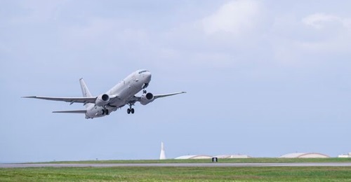 A Royal New Zealand Air Force Boeing P-8A Poseidon takes off from Kadena Air Base in November 2025, during a deployment to monitor North Korean sanctions evasions at sea.