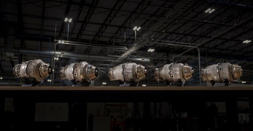 A photo showing the evolution of Beehive Industries' Frenzy 8 engine, from first engine to test at left to a flight-ready production unit at the far right.