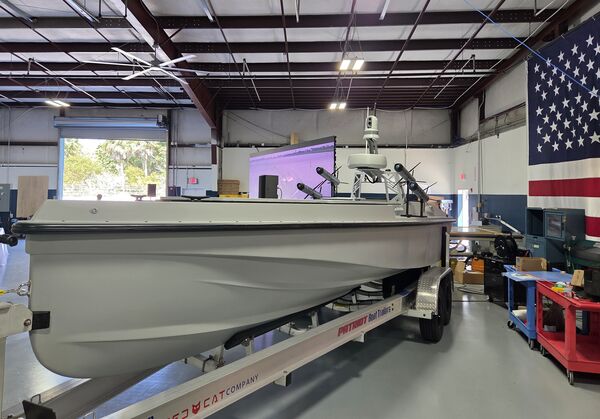 A Blue Ops unmanned surface vessel inside an industrial facility.
