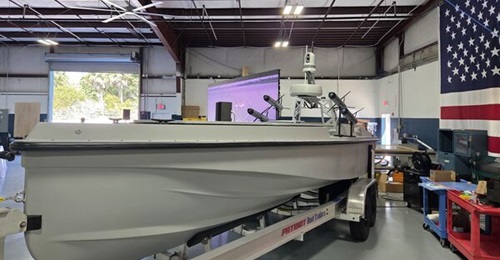 A static display of the Blue Ops 7-m Variant 7 USV at the company's headquarters in West Palm Beach, Florida. Blue Ops has partnered with Haddy to 3D print such boats.