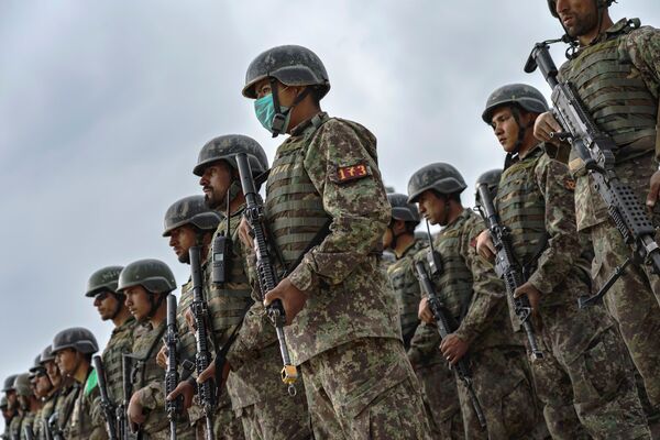 Afghan commandos in formation after taking part in an exercise on 28 April. US President Joe Biden announced on 25 June that he has asked Congress to grant more than USD3.3 billion in financial assistance for the ANDSF in 2022 (Marcus Yam/Los Angeles Times via Getty Images)