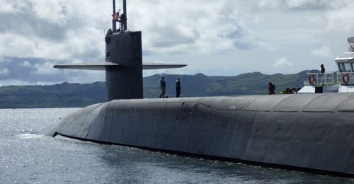 Later-block Virginia-class attack submarines are meant to replace the firepower of ageing guided-missile submarines like USS Ohio (SSGN 726), shown here operating off the coast of Guam.
