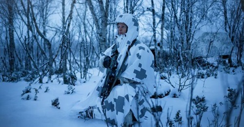 Saab's Barracuda thermal and visual camouflage poncho, launched in May 2026.