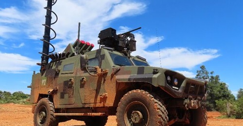 Taiwan's NCSIST unveiled an unmanned wheeled reconnaissance vehicle armed with a 12.7 mm RCWS and Jing Feng UAV.