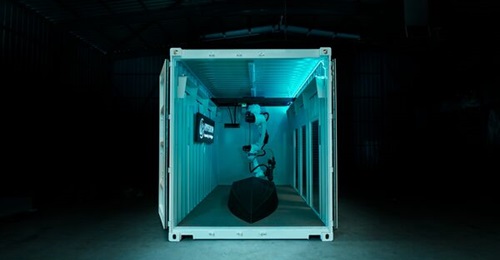 A deployable TitanCell 3D printing system building a Astra 460 USV hull.