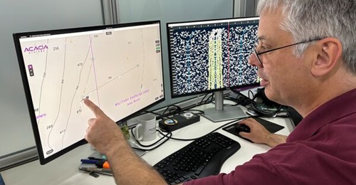 An Acacia Systems official inspects data processed by the company's Onyx software.