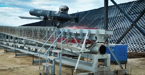 Image from the Kremlin's 9 May 2026 Victory Day parade video showing a Geran-5 OWA UAV during launch.