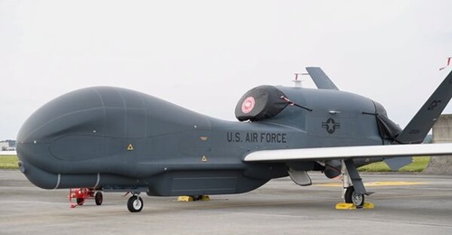 An RQ-4 Global Hawk, assigned to the 4th Reconnaissance Squadron, sits on the flightline at Yokota Air Base in Japan in May 2023.
