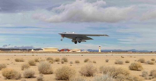 A B-21 Raider conducts flight tests, which includes ground testing, taxiing and flying operations, at Edwards Air Force Base, California, in June 2026.