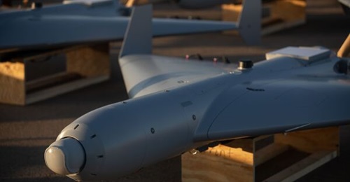 A Low-cost Unmanned Combat Attack System (LUCAS) positioned on the tarmac at a US Central Command base.