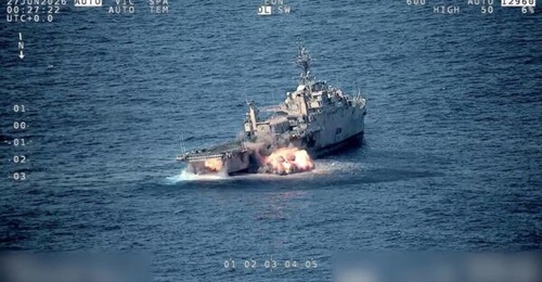 A Harpoon air-to-surface missile launched by a Royal New Zealand Air Force (RNZAF) P-8A strikes a decommissioned target ship, USS Juneau (LPD 10), near the Mariana Islands Range Complex on 27 June 2026. (NZDF)