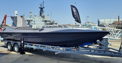 The Kraken K3 Scout USV as displayed at the NIAG plenary in Portsmouth. A possible C-UAV interceptor is displayed in front of the USV.