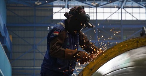 A PT PAL employee conducts metal fabrication work as the company prepares to begin construction of Indonesia's first Scorpene submarine.