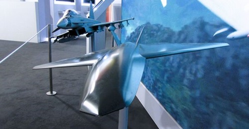 BAE Systems' Autonomous Collaborative Platform (ACP) loyal wingman concept flying alongside a Eurofighter Typhoon in this Farnborough International Airshow 2026 concept display.
