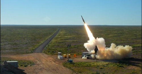 A Standard Missile 2 (SM-2) is fired from a Derringer trailer-mounted Expeditionary Launch System during 'Taipan Strike 26' at the Woomera Test Range in South Australia.