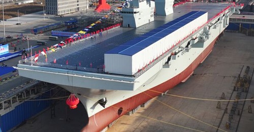 China's first Type 076 amphibious assault ship, Sichuan, is seen at its launch at Hudong-Zhonghua Shipbuilding in December 2024.
