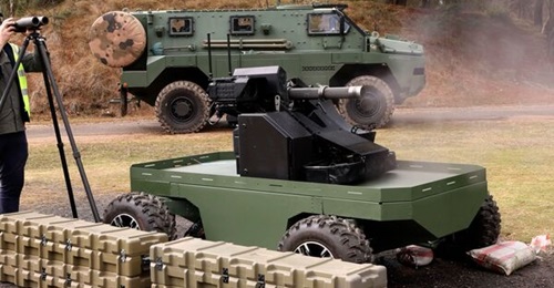 Thales Australia's Guardian Angel UGV photographed alongside a Bushmaster PMV.