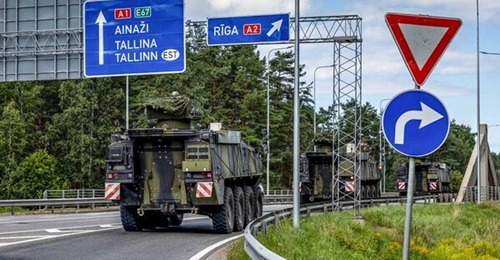Piranha 5 APCs of the Danish combat battalion driving towards Riga.