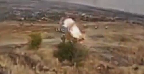 A Russian T-72B3A tank, identified with the number 133, firing what is likely its Arena-M APS against an incoming UAV in a video posted in July 2026.