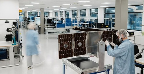 Image of workers at Kongsberg NanoAvionics facility producing MP42H microsatellite buses shared on 24 August 2026.