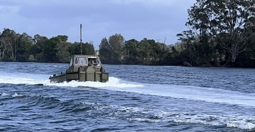 BEB manoeuvres a floating bridge bay during wet-gap crossing operations; the platform is powered by twin waterjets to provide the thrust and manoeuvrability required for bridge assembly and stabilisation.