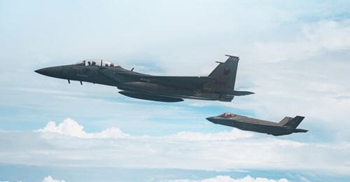A Republic of Singapore Air Force (RSAF) F-15SG operates alongside a USAF F-35A over Singapore in 2024. The RSAF aims to operate a fighter fleet with F-15SG and F-35A/B aircraft as its future combat force.