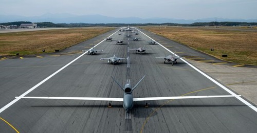 The Japan Air Self-Defense Force (JASDF) operates its RQ-4B Global Hawks from Misawa Air Base, which also hosts rotational deploys of USAF Global Hawks such as the platform displayed in this 2024 photo, alongside USAF and JASDF manned aircraft.