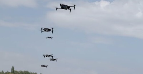 Screengrab from Dstl video depicting the Swarm Capability Test Bed (CTB) being used to control at least seven UAVs during trials.