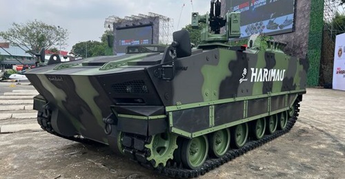 A Harimau APC is displayed at Indo Defence 2025, held in Jakarta.