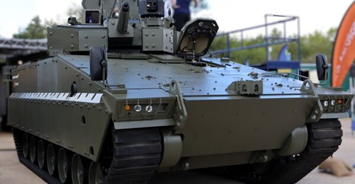 Lockheed Martin UK turret on Hanwha's Redback IFV, displayed at the DVD exhibition in September 2026.