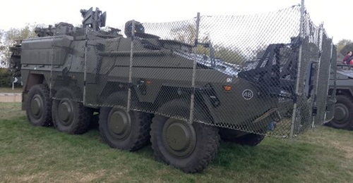 British Army Boxer APC displayed with AmSafe anti-RPG net at DVD 2026.