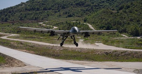 GA-ASI's Mojave short takeoff and landing (STOL) demonstrator UAV operates over a simulated battlefield in South Korea in September 2026.