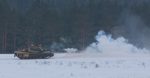 An M1A2 Abrams tank of 6th Squadron, 9th Cavalry Regiment, 1st Cavalry Division, US Army firing during a combined arms live fire exercise near Tapa, Estonia, on 19 February 2026.