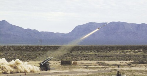An AIM-120 AMRAAM missile leaves the four-round CLAWS launcher to begin the system s first target interception.
USA