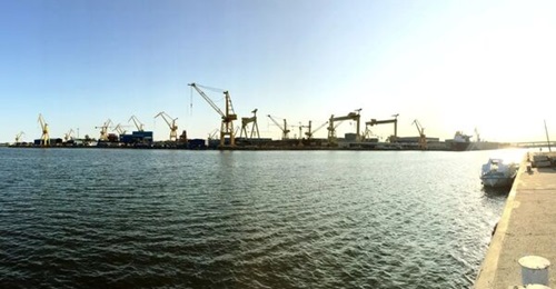 Mangalia Shipyard when Damen managed the site, with rows of cranes and cargo containers lining the waterfront. Image taken from a 7 June 2019 press release issued by Damen.