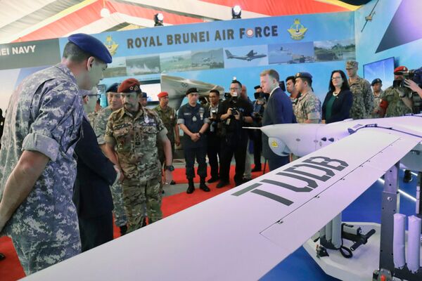 The Sultan of Brunei, Hassanal Bolkiah, is seen here inspecting the RBAirF's latest acquisition – an Insitu Integrator UAS – during an event held in June to mark the 60th anniversary of the Royal Brunei Armed Forces. (US Embassy in Brunei Darussalam)