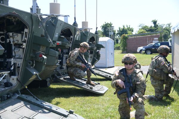 US Army soldiers emerge from Stryker vehicles during an ITN demo at Aberdeen Proving Ground, Maryland, on 30 June.  (US Army )