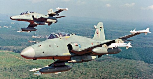 A file image depicting a Royal Malaysian Air Force (RMAF) Hawk 208 in the foreground with a Hawk 108 in the background. The RMAF scrambled its Hawk 208s on 31 May in response to what it considers to be an incursion of Malaysian airspace by 16 PLAAF air...