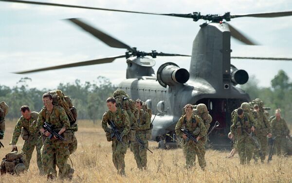 Soldiers from the 1st Battalion, Royal Australian Regiment, disembarking from a CH-47F Chinook attached to the 5th Aviation Regiment. Canberra announced on 8 July that it has received the first two of four recently ordered CH-47Fs for the army. (Commonwealth of Australia)