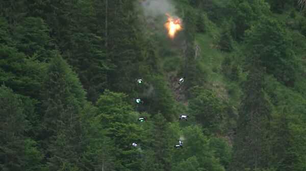 Octocopters begin to drop like flies after being hit by air bursts from AHEAD munition fired by a Revolver Gun Mk 3 at Rheinmetall's Ochsenboden firing range in Switzerland on 23 June. (Rheinmetall Air Defence)